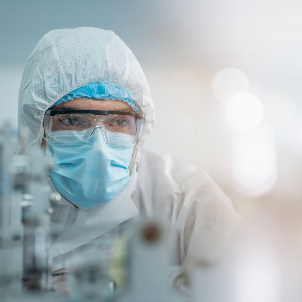 Scientist in sterile clothing